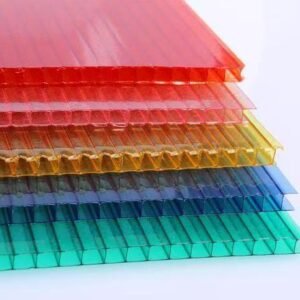 3aac999c5701e9f01c238103b090ba2c - Stack of translucent colored acrylic sheets arranged in a rainbow gradient (red to teal).