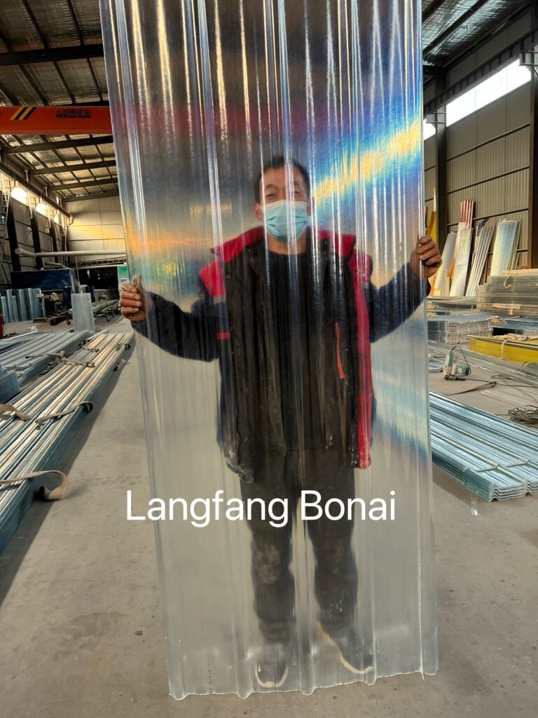 Man wearing a face mask stands behind a large translucent plastic panel in a warehouse; caption reads 'Langfang Bonai'.